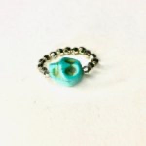 Turquoise Skull stretch ring. One size fits all